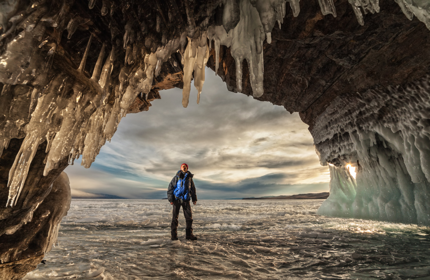 Hiker across the ice cave.